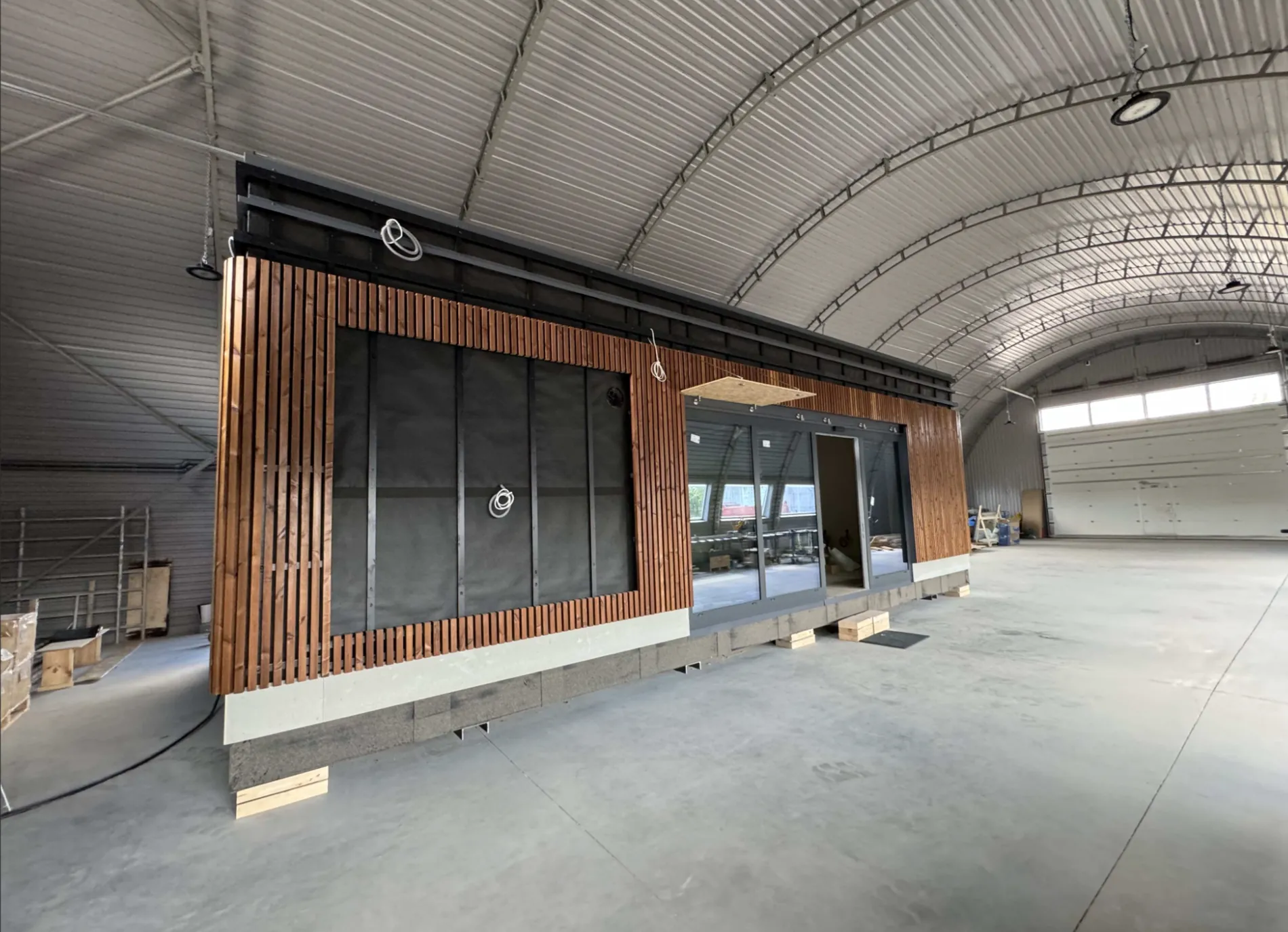 Timber-clad module in the hall